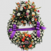 Corona de flores fúnebres variadas para enviar al tanatorio